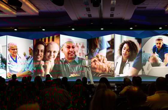 A person giving a presentation at a conference
