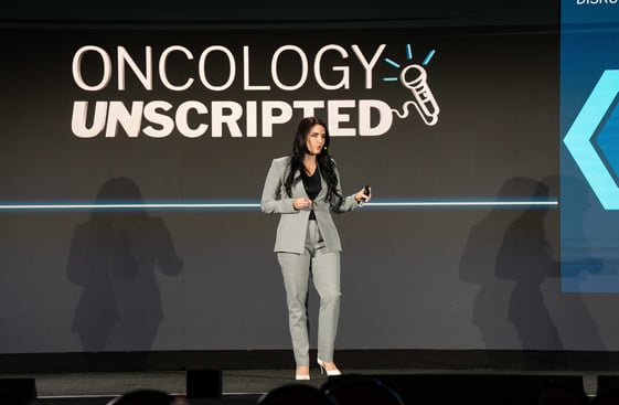 A person giving an Oncology Unscripted presentation